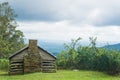 Log Cabin, Valley and Stormy Clouds on the Blue Ridge Parkway Royalty Free Stock Photo