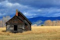 Log cabin in western montana meadow Royalty Free Stock Photo