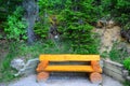 Log chair on Canadian forest trail Royalty Free Stock Photo