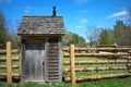 Log Fence Outhouse Royalty Free Stock Photo