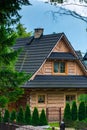 log house with a beautiful courtyard in European Royalty Free Stock Photo