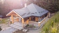 Log house chalet in mountains