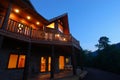 Log House Exterior at dusk