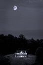 Log House on Hill at Night Royalty Free Stock Photo