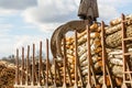 Log loader or forestry machine loads a log truck Royalty Free Stock Photo