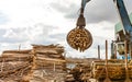 Log loader or forestry machine loads a log truck Royalty Free Stock Photo