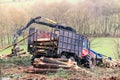 Log loader machine felled in a Galician forest. Royalty Free Stock Photo