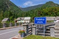 Sign with Bridge over River Predelica from Predil Pass in Log pod Mangartom. Bovec, Slovenia, Europe