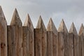 Log post fence with a point. Royalty Free Stock Photo