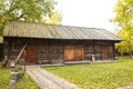 A log shed in the backyard of a 19th century manor house