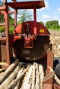 Log Slasher Saw with Wood in Deck