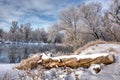 Log on the winter river Royalty Free Stock Photo