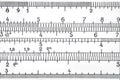 Logarithmic scale of the slide rule extremal close up Royalty Free Stock Photo