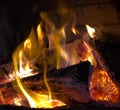 Logfire in fireplace Royalty Free Stock Photo