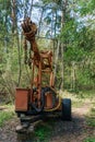 Logging equipment in the forest, loading logs for transportation. Harvesting and storage of wood in the forest. Transportation of Royalty Free Stock Photo