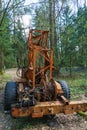 Logging equipment in the forest, loading logs for transportation. Harvesting and storage of wood in the forest. Transportation of Royalty Free Stock Photo