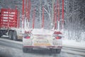 A logging truck on ice went into a ditch. Accident on the road in winter Royalty Free Stock Photo