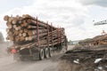 Logging truck logs at mill Royalty Free Stock Photo