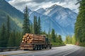 logging truck with timber speeding on a forested mountain road Royalty Free Stock Photo