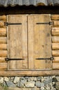 Loghouse wooden door with a padlock