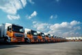 A logistic companys yard full of trucks ready for commercial freight transportation