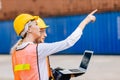 Logistic shipping worker team work working in shipping port cargo containers for export and import goods monitor with laptop Royalty Free Stock Photo