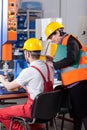 Logistician controlling worker Royalty Free Stock Photo