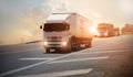 Logistics import export and transport industry, Semi trailer truck on a highway driving on sunset background Royalty Free Stock Photo