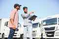 Logistics manager controlling truck driver schedule