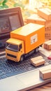 Logistics and shopping service truck, parcels, and laptop keyboard Royalty Free Stock Photo