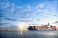 Logistics and transportation of International Container Cargo ship in the ocean at twilight sky, Freight Transportation, Shipping Royalty Free Stock Photo