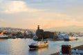 Logistics and transportation of international container cargo ship with ports crane bridge in harbor at dusk for import export ba Royalty Free Stock Photo