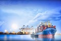 Logistics and transportation of International Container Cargo ship with ports crane Royalty Free Stock Photo