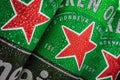 logo on aluminum cans of Heineken beer. Heineken Dutch brewing company Royalty Free Stock Photo