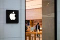 The logo of Apple company on a wall of one of its Stores Royalty Free Stock Photo