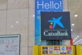04.08.2023. Barcelona, Spain, logo of the bank la caixa on a machine to withdraw money inside the Barcelona Sants train station