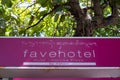 Logo or brand or sign of Fave Hotel with Balinese script