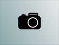 Black camera logo on blue background