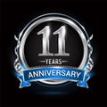 Logo celebrating 11th years anniversary with silver ring and blue ribbon