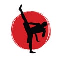 Logo for the club of martial arts. Karate, kung fu or wushu. Silhouette of a fighter against the background of the red