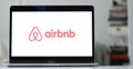 Logo design of airbnb on a laptop screen in blurred background Royalty Free Stock Photo