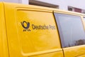 Logo from Deutsche Post and DHL on yellow postcar Royalty Free Stock Photo