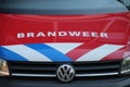 Logo of the dutch fire fighters brigade in the Netherlands with name Brandweer in dutch and the red,white blue striping on red c