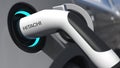 Charging electric car plug with HITACHI logo on it. Editorial conceptual 3d rendering