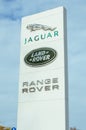 Logo of famous automotive companies Jaguar, Land Rover and Range Rover, on blue sky background