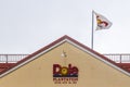 Logo and flag on building of Dole pineapple plantation in Wahiawa, Oahu, Hawaii, USA