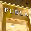 Logo Furla company above the store which sells bags and leather good - Moscow, Russia, December 17, 2020