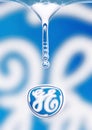 Logo of General Electrics reflecting in water drop