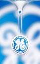 Logo of General Electrics reflecting in water drop