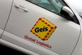 The logo of Gies logistics company on a door of a white Skoda Octavia fleet car Royalty Free Stock Photo